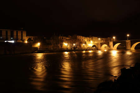 City of Limoux and river Aude by night in Occitanie, Franceの写真素材