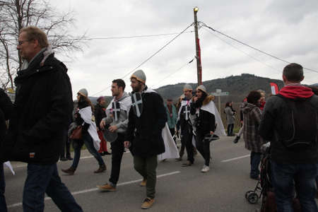 people procession during festival Toques et Clocher to celebrate the vineyards of the Aude in...