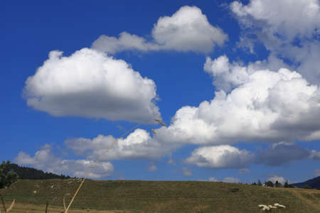 cumulo nimbus clouds and Pyrenean landscape, Aude in southern of France