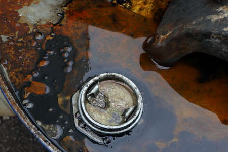 engine oil and oil cans in a car garageの写真素材