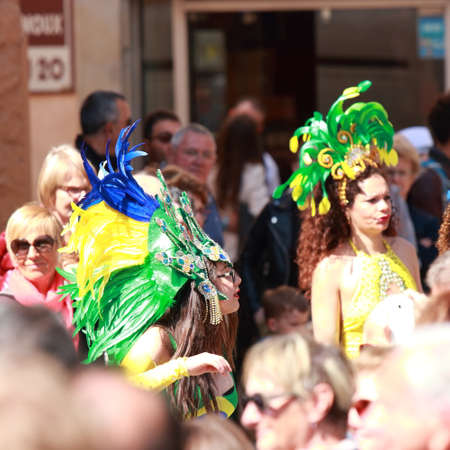 Brazilian dancer and spectators at the carnival of Limoux in the Aude, Languedoc in the south of...