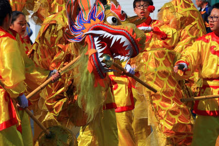 Asian parade with a dragon at the Limoux carnival in Aude, Occitanie in the south of Franceのeditorial素材