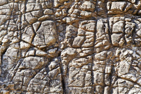 Landscape or portrait of nature natural weathered rock texture akin to crazy paving on the route to...