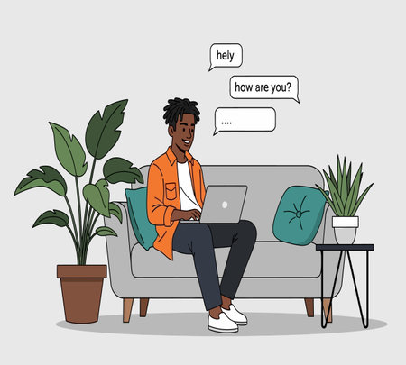 Vector illustration of a young african american man sitting on a sofa with a laptop in his hands and a speech bubble.の素材