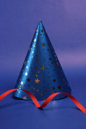Party hat on blue background 