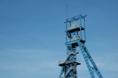 Coal mine  Tower on blue sky の写真素材