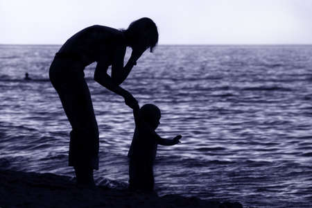 Family on the beachの写真素材