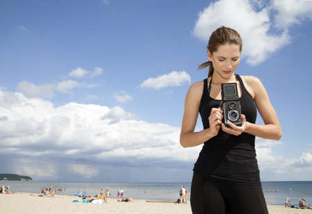 photographer girl on the beachの写真素材
