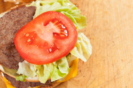 Delicious hamburgers on a wooden table.の写真素材