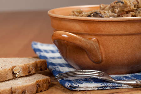 Traditional polish sauerkraut (bigos) with mushrooms and cranberries.の写真素材