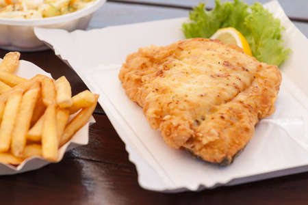 Fried fish on a paper plate.の写真素材