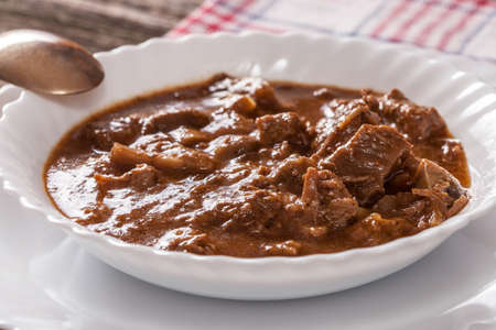 Goulash soup with pork and mushrooms.
