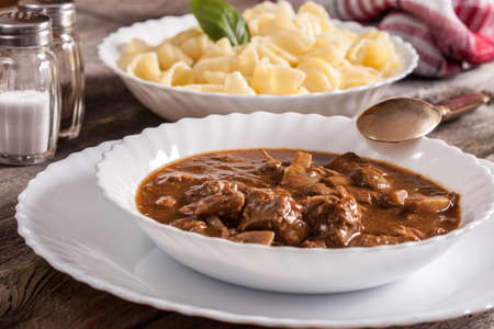Goulash soup with pork and mushrooms.