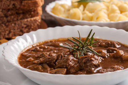 Goulash soup with pork and mushrooms.