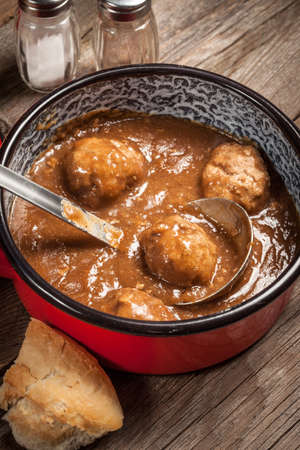 Tasty beef meatballs in the sauce.の写真素材