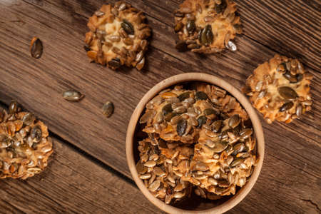 Cookies with pumpkin seeds and cinnamon. Selective focus.の写真素材