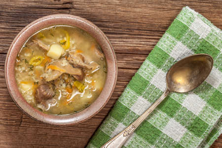 Soup of porridge on a wooden tableの写真素材