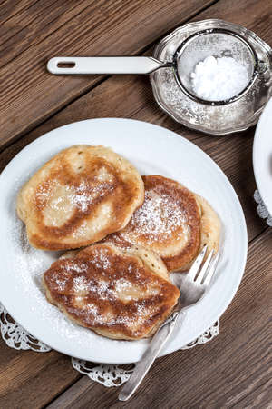 Polish pancakes with powdered sugar.