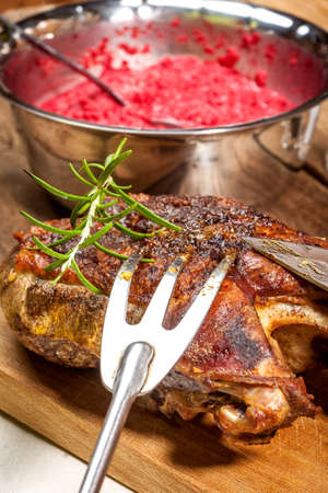 Roasted duck breast on a wooden chopping board.の写真素材