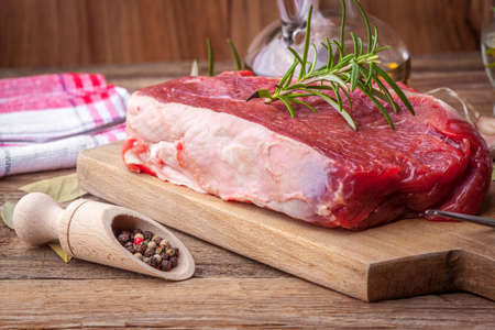 Raw beef steak ready to grill. Selective focus.の写真素材