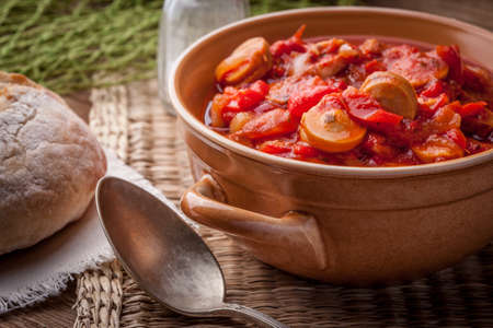 Lecho - tasty Hungarian stew with peppers and sausage.の写真素材