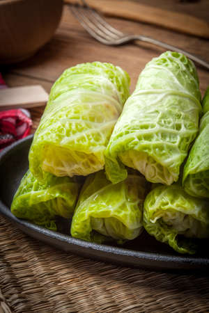 Cabbage rolls stuffed with meat and grits prepared for cooking.の写真素材