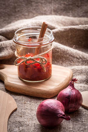 Ajvar - delicious dish of red peppers, onions and garlic.の写真素材