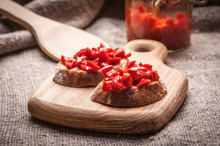 Ajvar - delicious dish of red peppers, onions and garlic.の写真素材