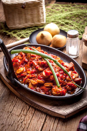Lecho - Delicious Hungarian dish in cast iron pan.の写真素材