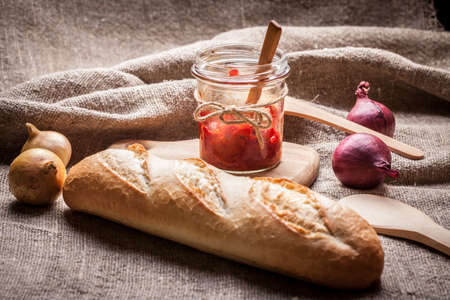 Ajvar - delicious dish of red peppers, onions and garlic.の写真素材