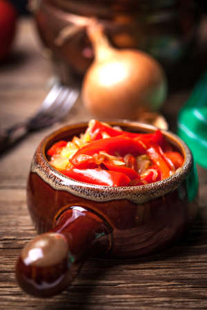Lecho - tasty Hungarian stew with peppers and sausage.の写真素材