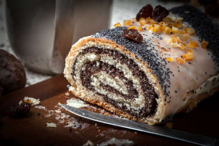 Poppy seed cake on wodden board. Selective focus.の写真素材