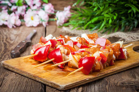 Raw skewers ready for grilling. Selective focus.の写真素材