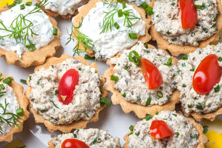 Muffins with smoked salmon pate, cheese and dill. Selective focus.の写真素材