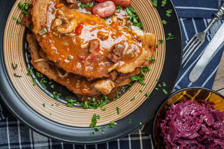 Potato pancakes with meat, vegetable, tomato and parsley. Selective focus.の写真素材