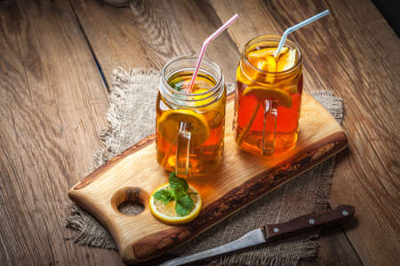Fresh homemade ice tea with lemon and mint.の写真素材