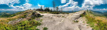 Landscape hills and mountains and blue cloudy sky in polish Beskid mountains.