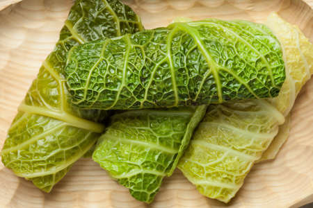 Cabbage rolls stuffed with meat and grits prepared for cooking.の写真素材