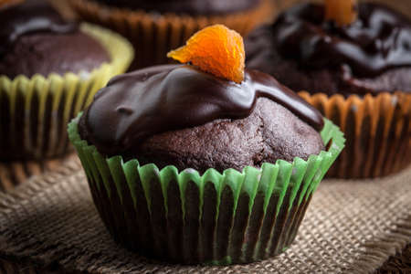 Tasty and fresh - homemade chocolate muffins. Shallow depth of field.