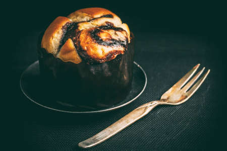Home made yeast roll with chocolate. Dark light. Instagram style filtred image.の写真素材
