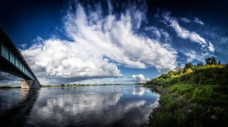 Vistula river flowing calmly on a sunny day.