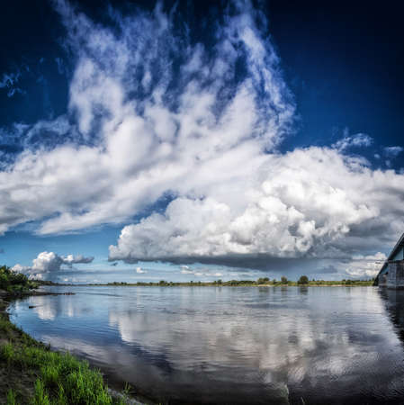 Vistula river flowing calmly on a sunny day.の写真素材