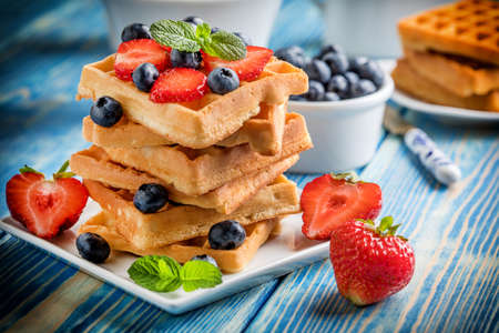 Waffles with berries. Selective focusの写真素材
