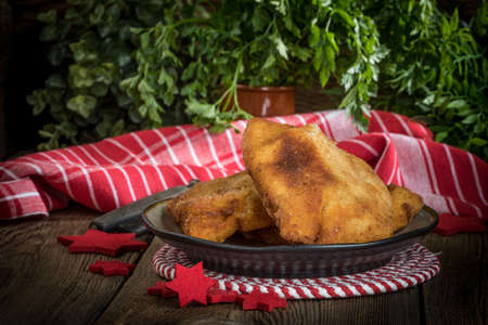 Fried cod slices in breadcrumbs. Small depth of field.の写真素材