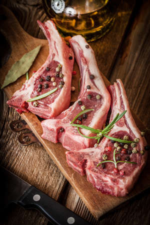 Raw lamb chop ready for frying. Selective focus.の写真素材
