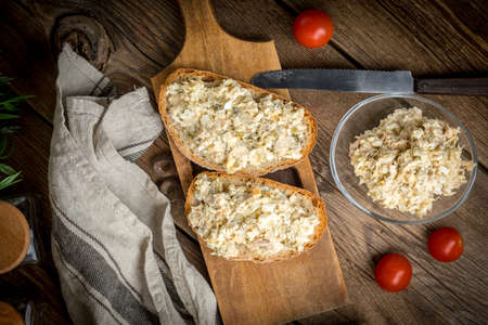 Slice of crusty bread with homemade mackerel fish paste.の写真素材