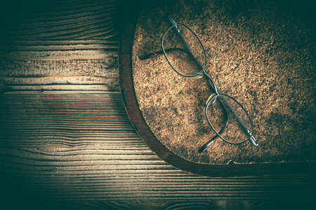 Old glasses on cork background.の写真素材