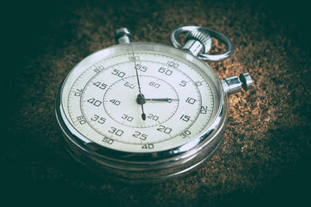 An old stopwatch on a cork background. Vintage style.の写真素材