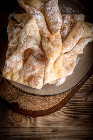 Faworki - Traditional Polish cookies served .