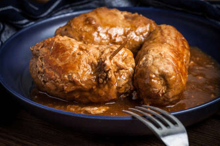 Tasty roulades beef on plate with sauce, close up.の写真素材